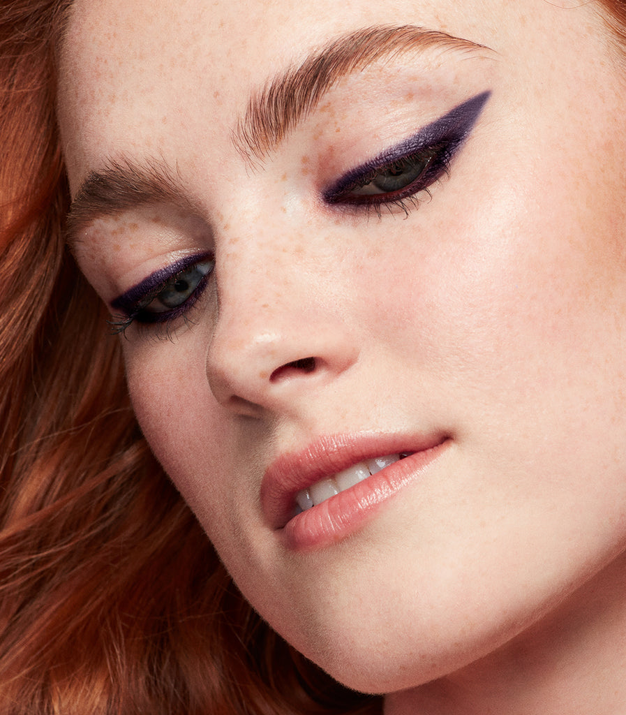 Askyla wears Continuum Gel Eyeliner in Violet Abyss