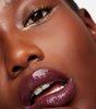 model wearing serum balm intense in lilac layer