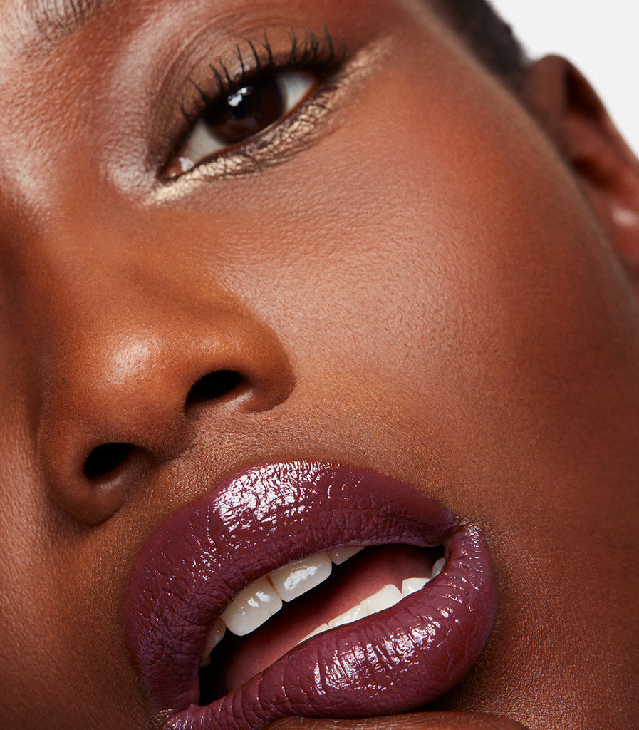 model wearing serum balm intense in lilac layer