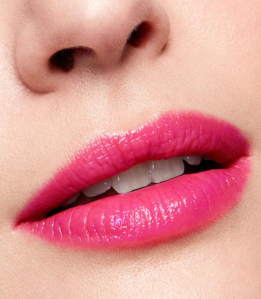 model wearing serum balm intense in pink cerise 